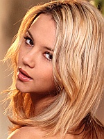 Ashlynn Brooke peels off her sexy white lingerie