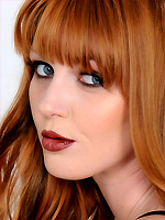 Marie McCray fingering her shaved snatch in bed