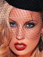 Kiara Diane exposing her body waring a veiled hat