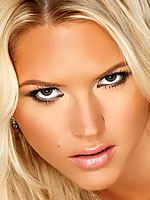 Ashley Mattingly exposing her body on the bed