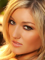 Katie Vernola sexily posing her body in the woods